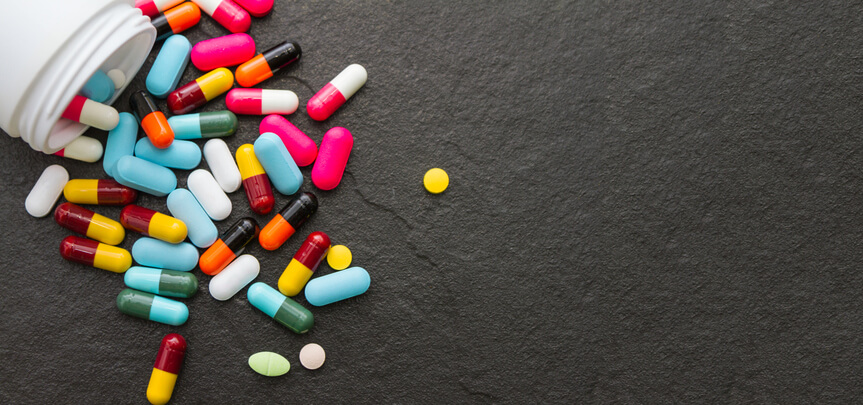 many-pills-and-tablets-on-black-background--479304376-867x407_17478929579018.jpeg